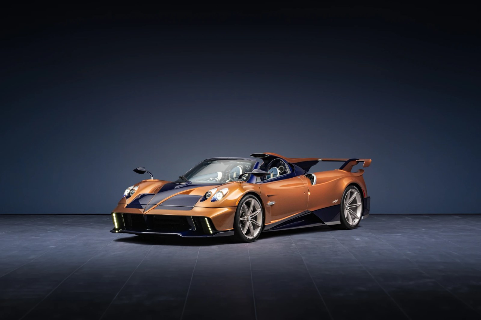 Rear view of the Pagani Huayra 70 Derecho showing the carbon fiber and exhaust system.