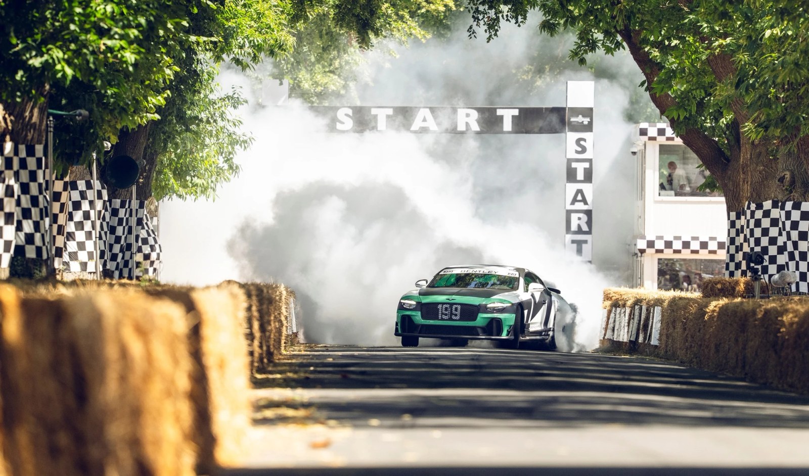 The Pymkhana Bentley Supersports doing a burnout at the Goodwood Festival of Speed.