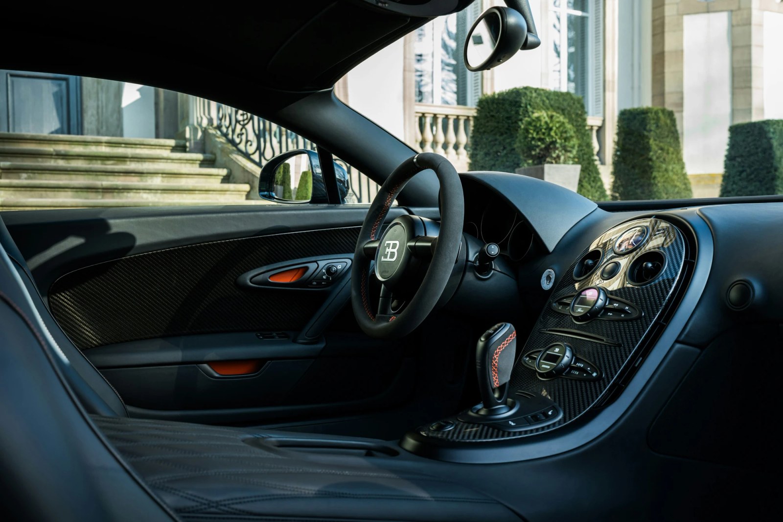 The meticulously restored interior of the Bugatti Veyron Super Sport, showing the refurbished leather seats.
