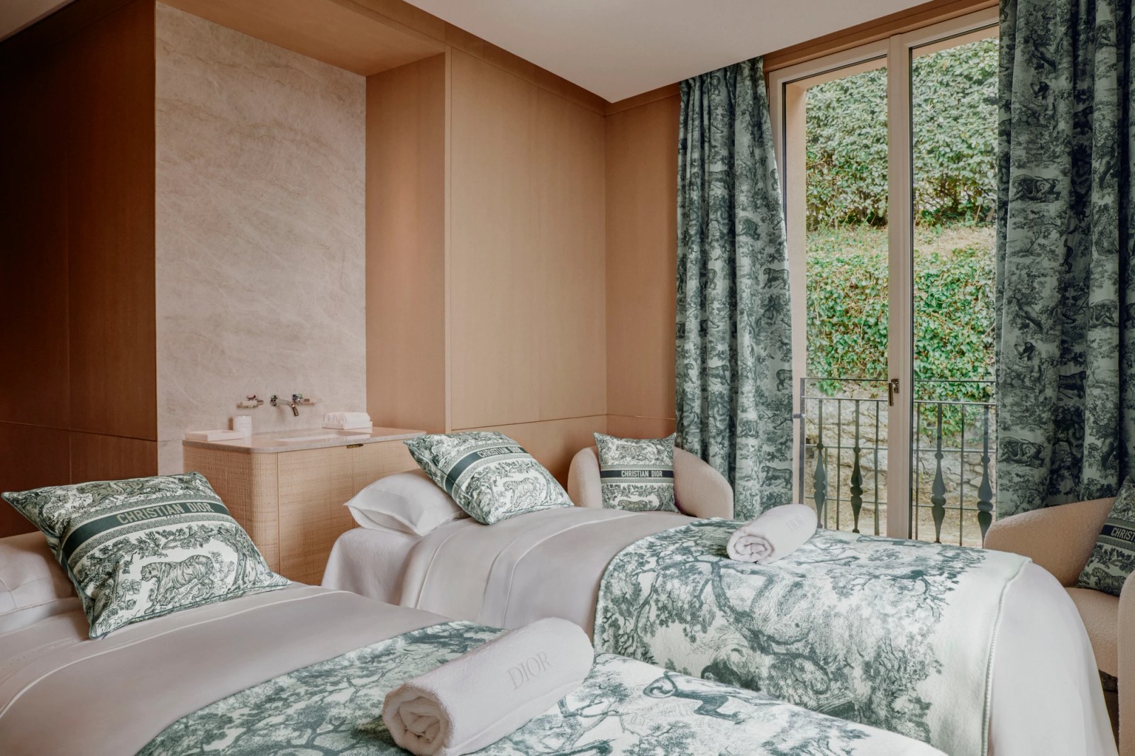 Close-up of the Dior Toile de Jouy fabric used in the spa's decor.