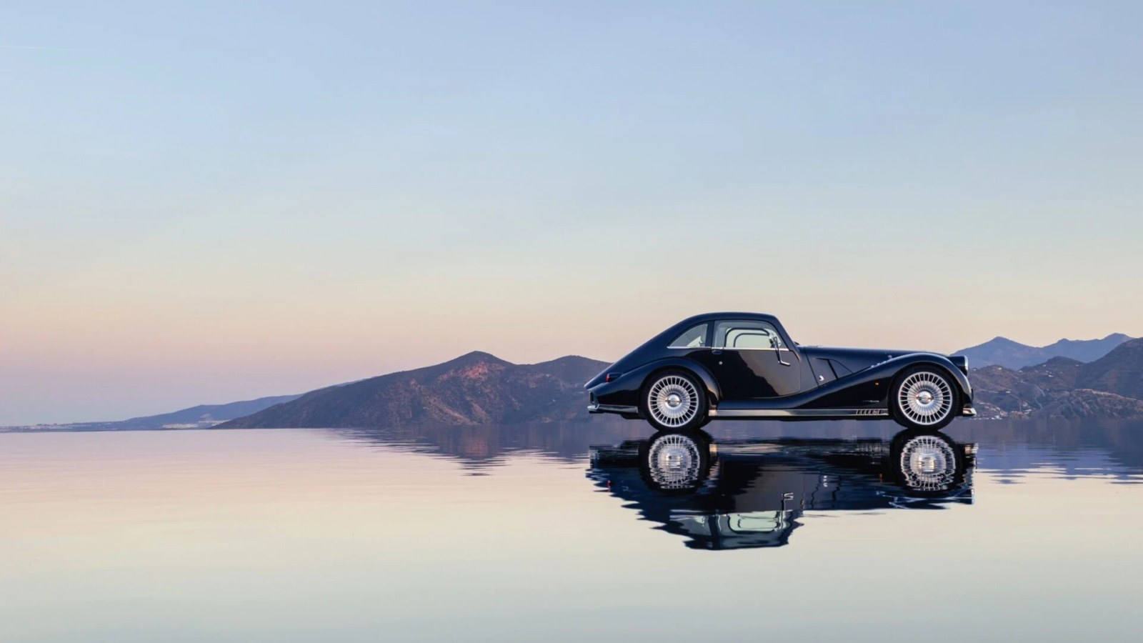 The Morgan Midsummer Coupé showing its dramatic glazed canopy and long silhouette.