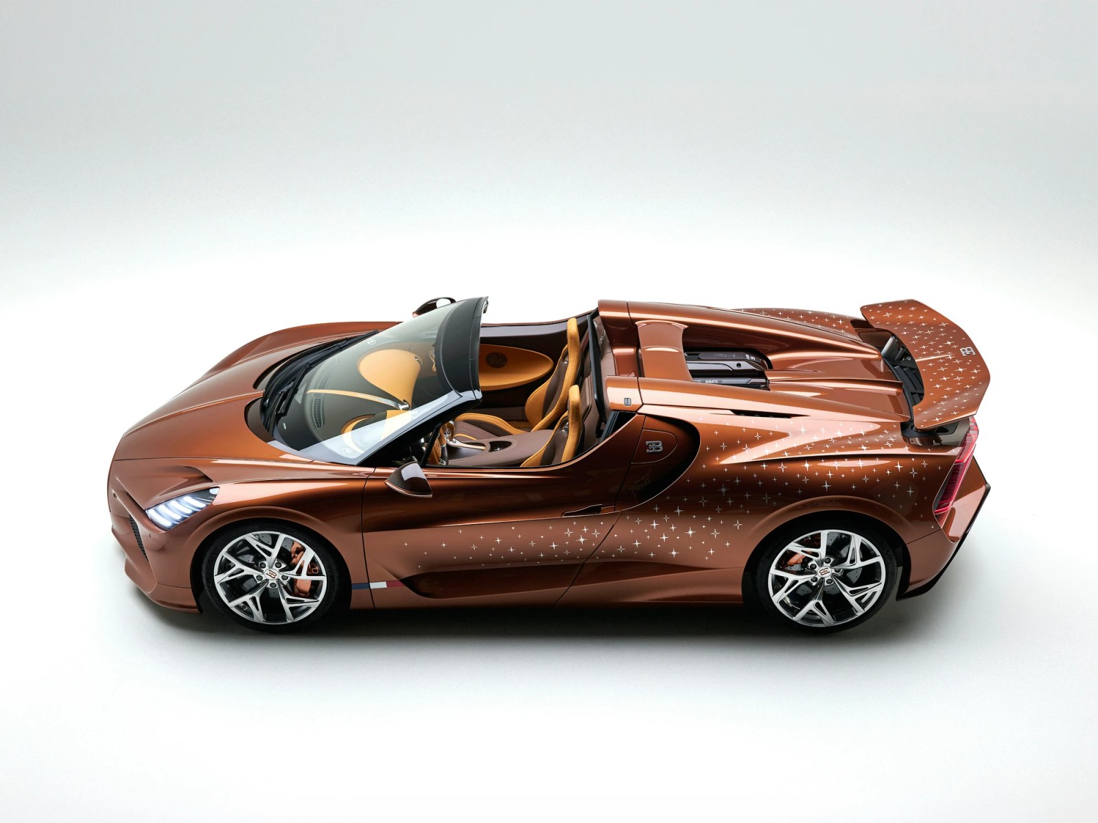 A hand-painted constellation of stars transforms the exterior of the Bugatti W16 Mistral ‘Le Retour du Jeune Prince’.