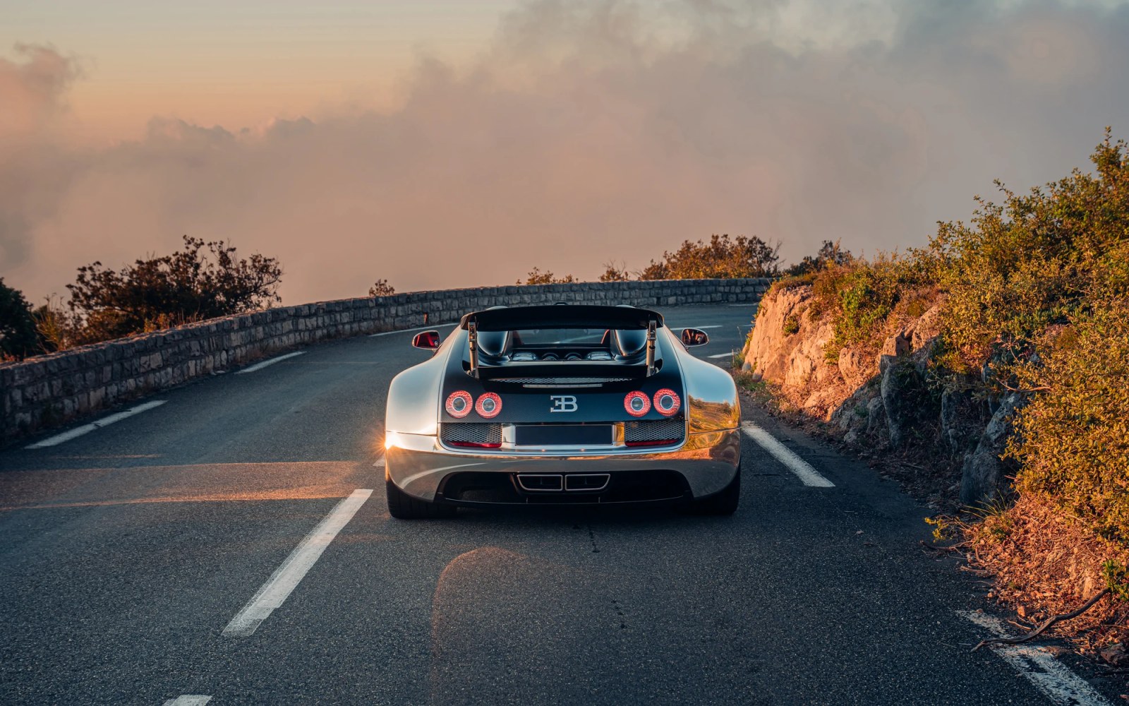 As the light shifts, the polished aluminum body of the BUGATTI VEYRON Grand Sport Vitesse reveals its every contour, transforming the hypercar into...
