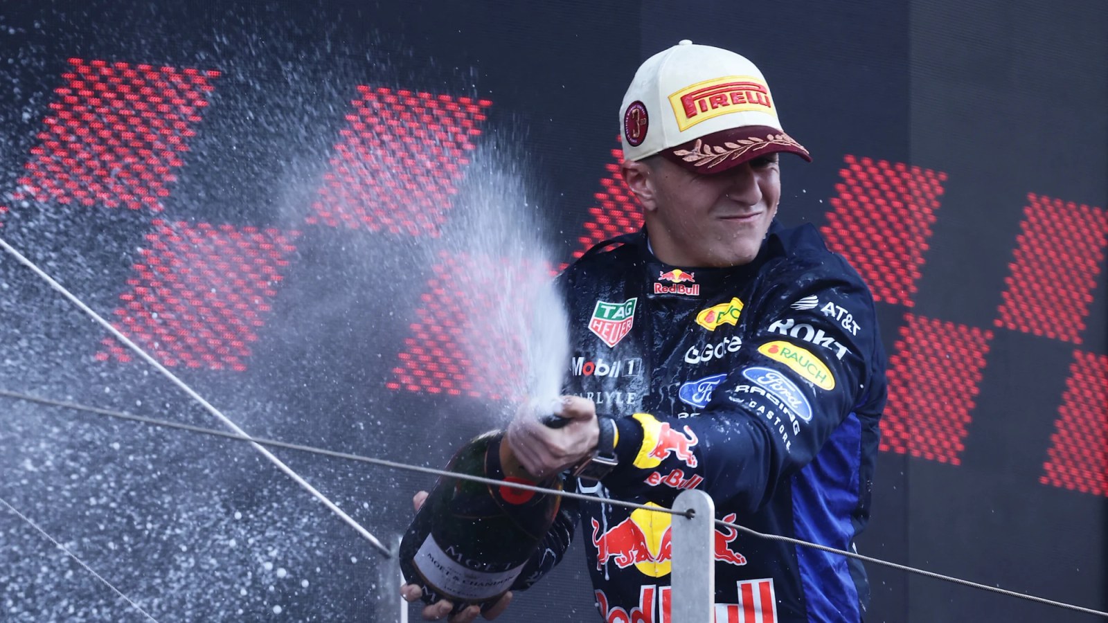 Isack Hadjar celebrating his first podium for Red Bull Racing in Monaco