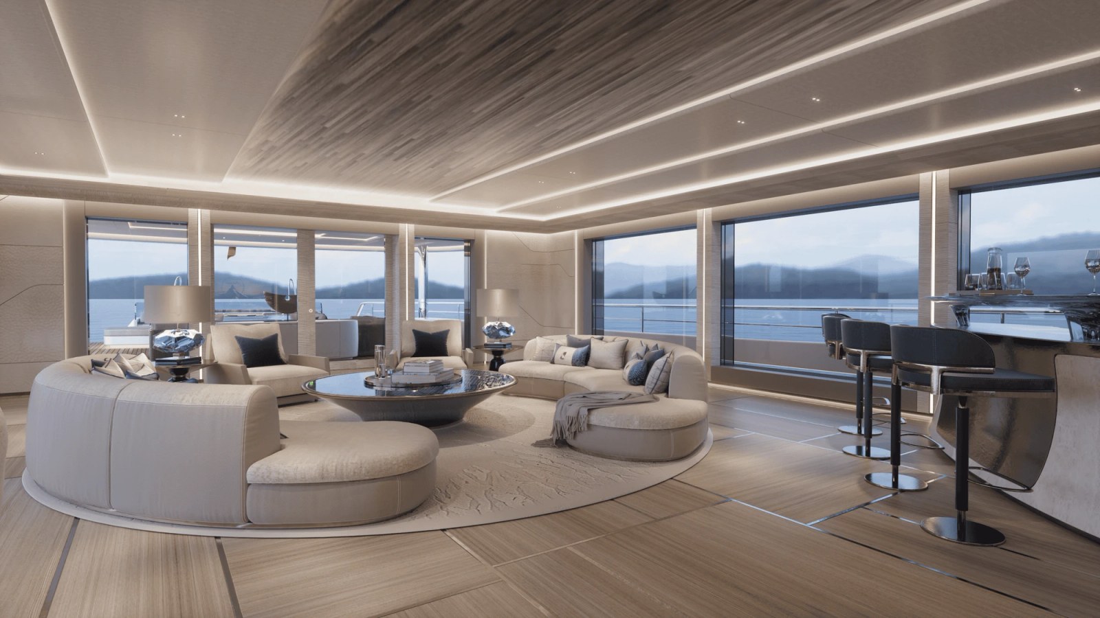 zügigen Beach Club mit ausklappbaren Plattformen, Gym und Spa. Auf dem Brückendeck lädt eine tiefergelegte Lounge mit Feuerstelle zum Open-Air-Kino ein. <img loading=