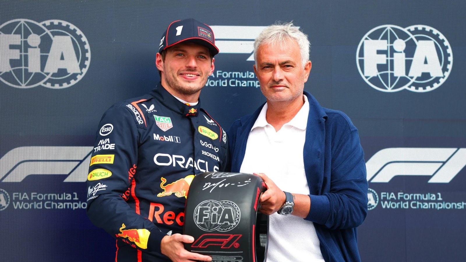 José Mourinho sharing a moment with Red Bull driver Max Verstappen.