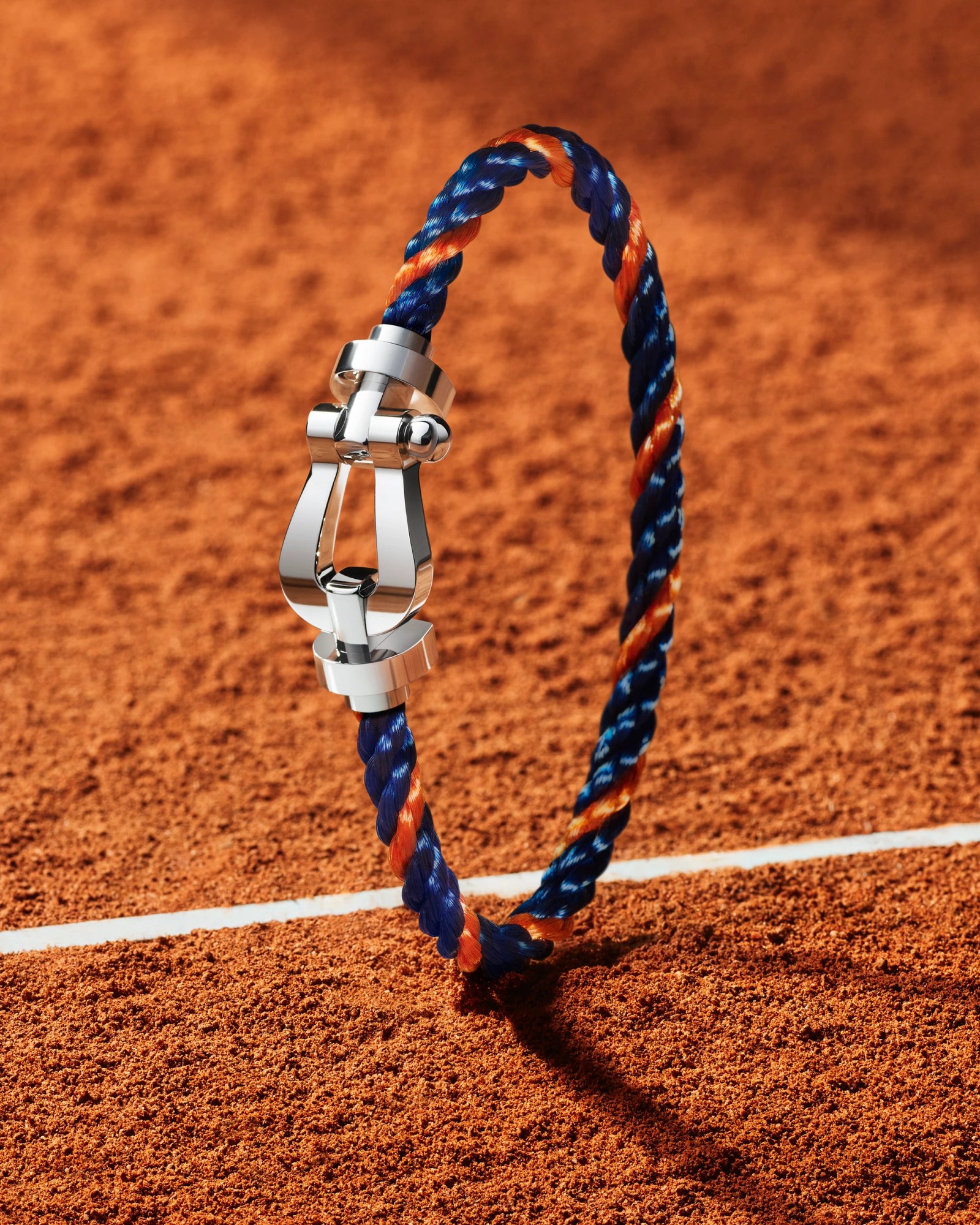 The new FRED Force 10 bracelet for Roland-Garros, showing the buckle detail.