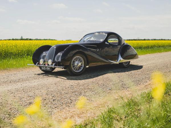 Nick Mason’s McLaren, Seinfeld’s Porsche, and The First Ferrari EV Lead the Monterey Sale